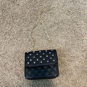 Black faux leather belt or shoulder purse. Start studded  adjustable strap